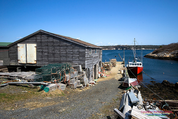 The Red Fishing Boat in the Cove